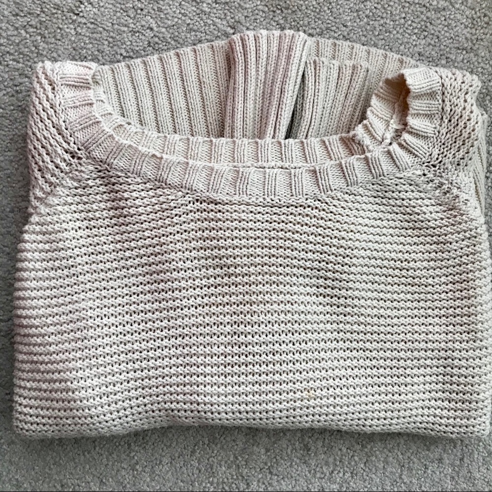 women’s poncho-style sweater.